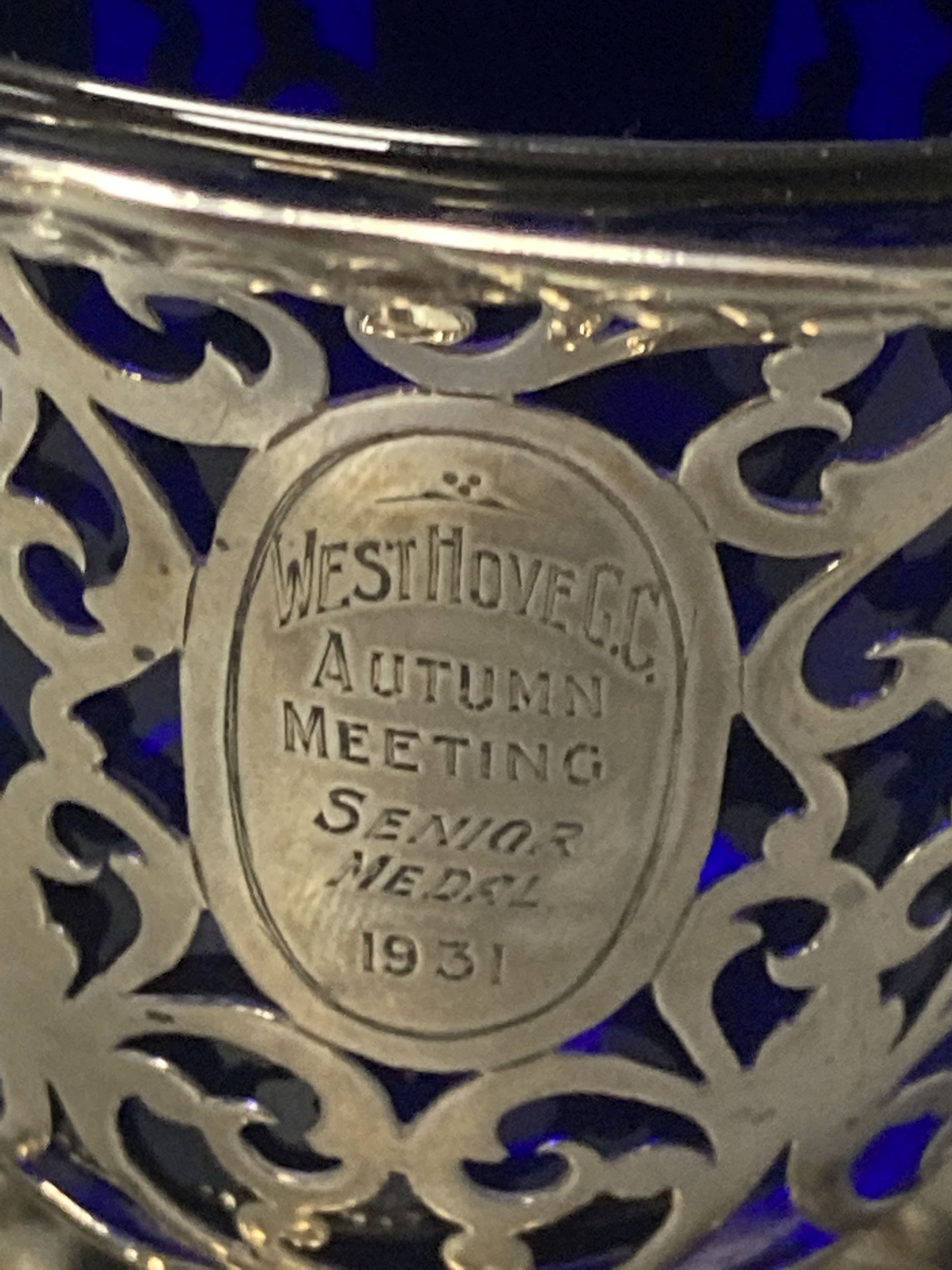 A Victorian pierced silver sugar basket, with blue glass liner and later engraved inscription, George Angell, London, 1854,